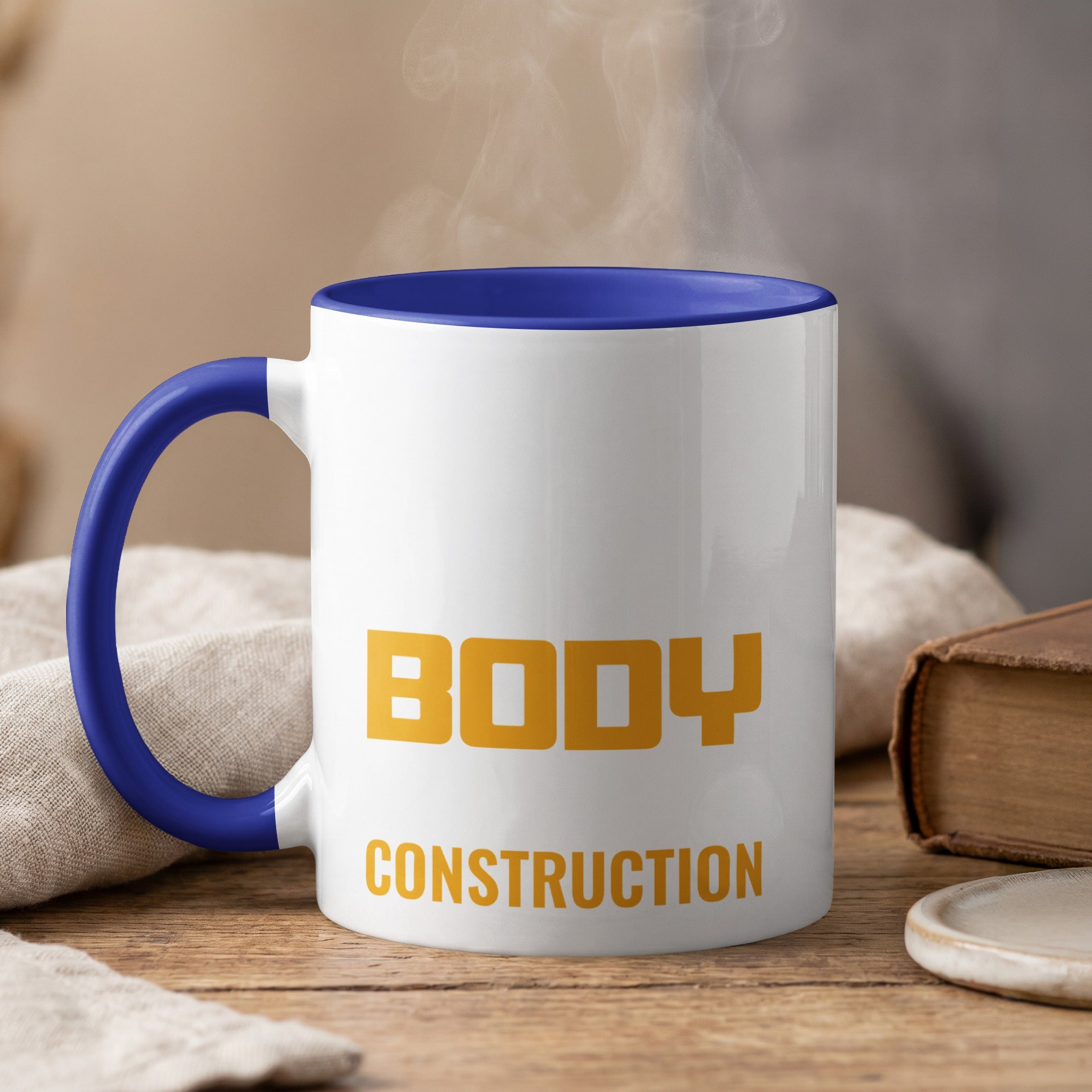 White mug with blue interior, featuring bold "BODY CONSTRUCTION" text.