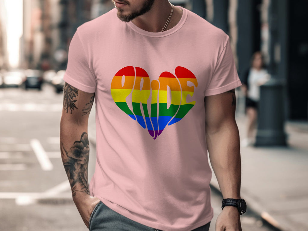 Pink t-shirt with rainbow pride heart graphic and wavy lettering.