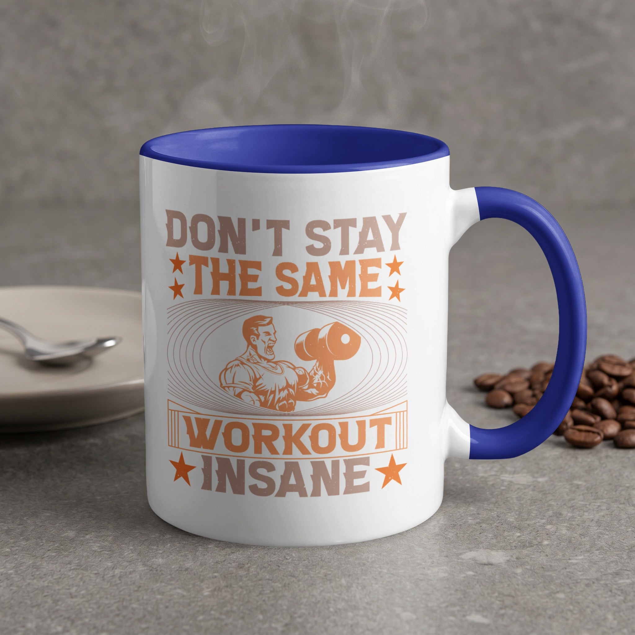 White mug with blue handle and "DON'T STAY THE SAME WORKOUT INSANE" text.