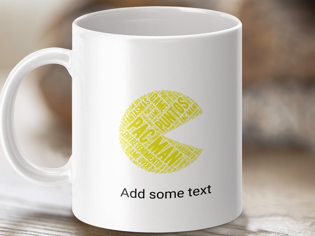 White mug with Pac-Man shape formed from game-related words and "Add some text."