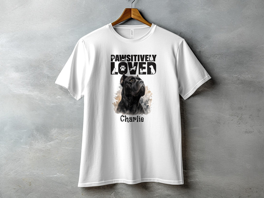 White t-shirt with black dog graphic and "Pawsitively Loved Charlie" text.