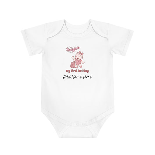 White baby onesie with pink airplane and "my first holiday Add Name Here" text.