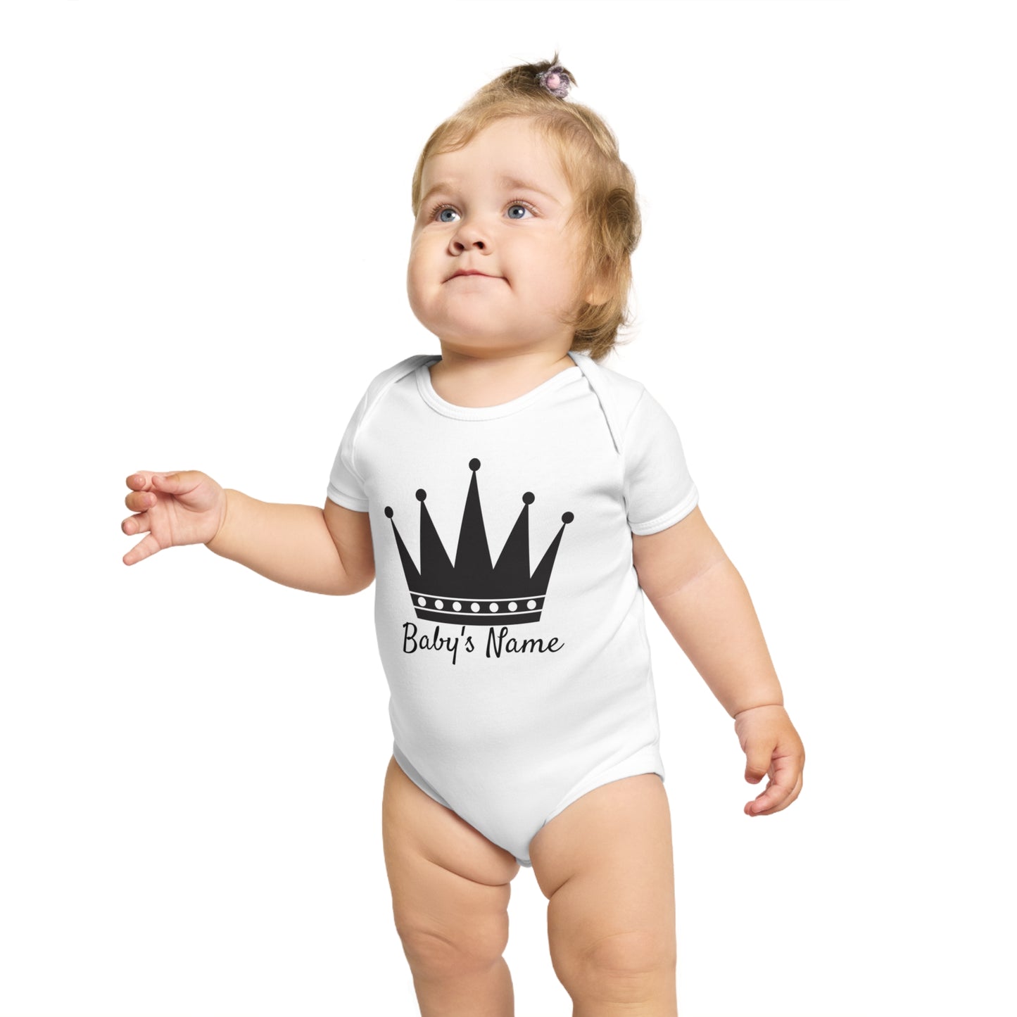 Baby in white onesie with black crown and "Baby's Name" text.