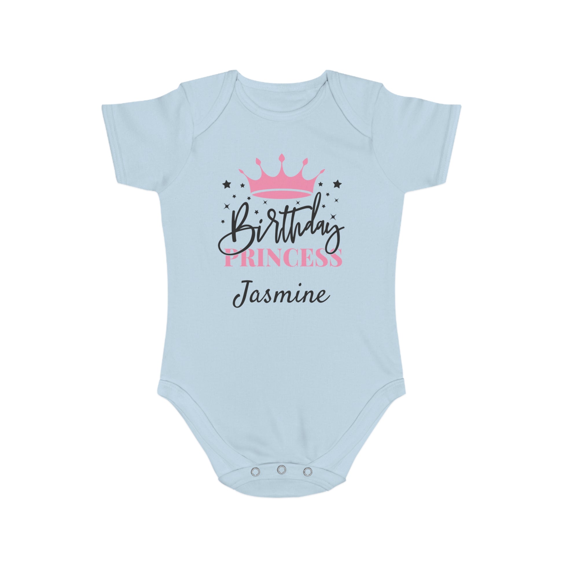 Light blue baby onesie with "Birthday Princess Jasmine" text and pink crown.