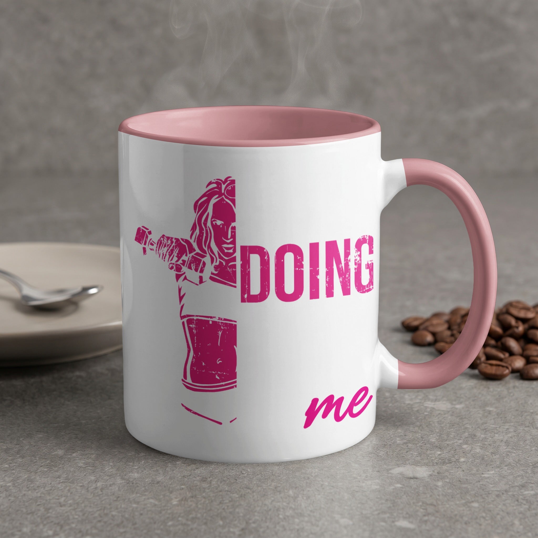 White mug with pink handle,  "DOING me" text and silhouetted woman.