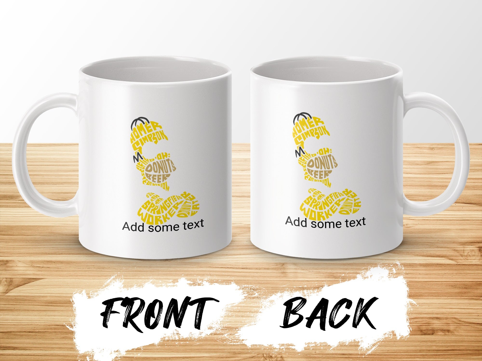 Two white mugs displaying "Homer Simpson," "Donuts," and "Springfield" text.