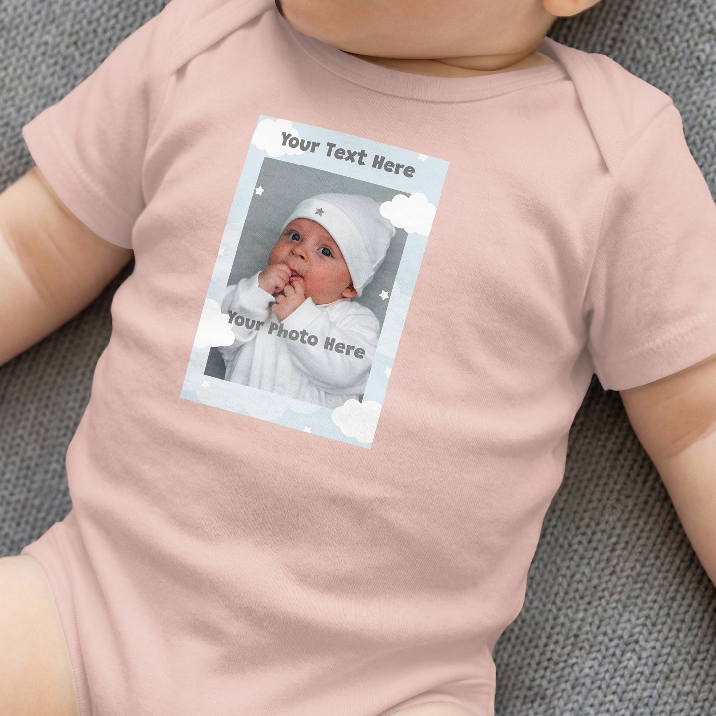 Pink baby onesie with customizable photo frame featuring text "Your Text Here".