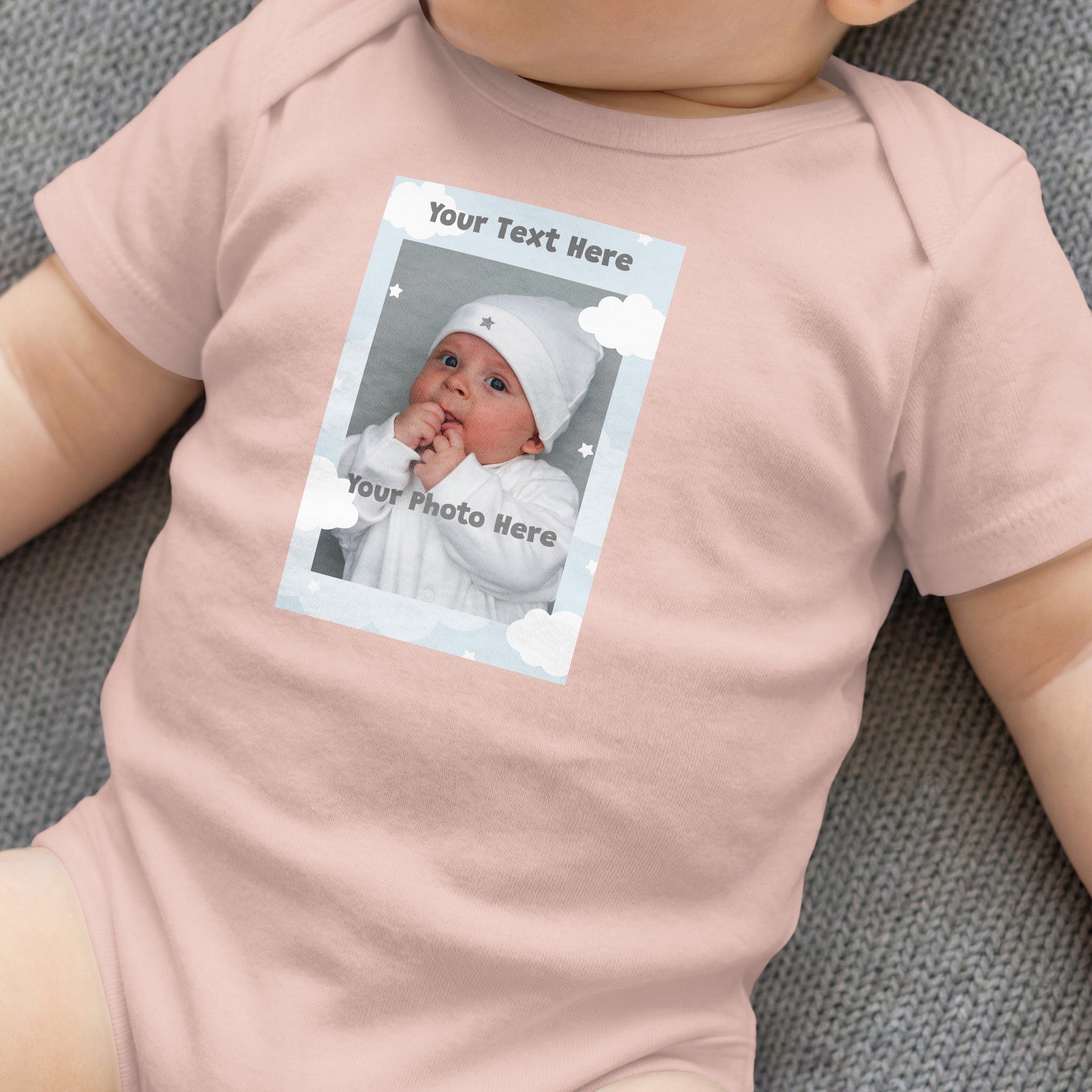 Pink baby onesie with customizable photo frame featuring text "Your Text Here".