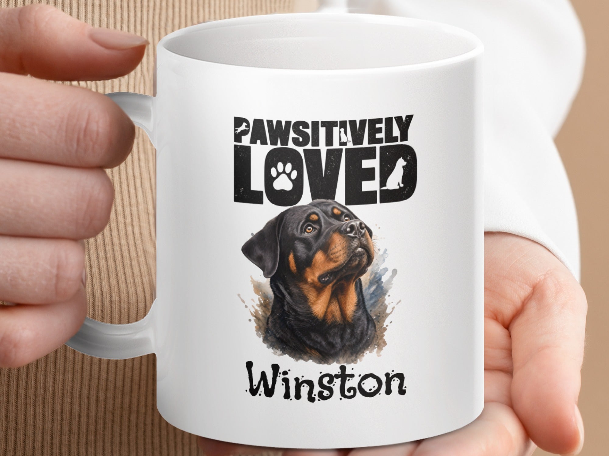 White mug with Rottweiler portrait, "PAWSITIVELY LOVED" text, and "Winston" name.