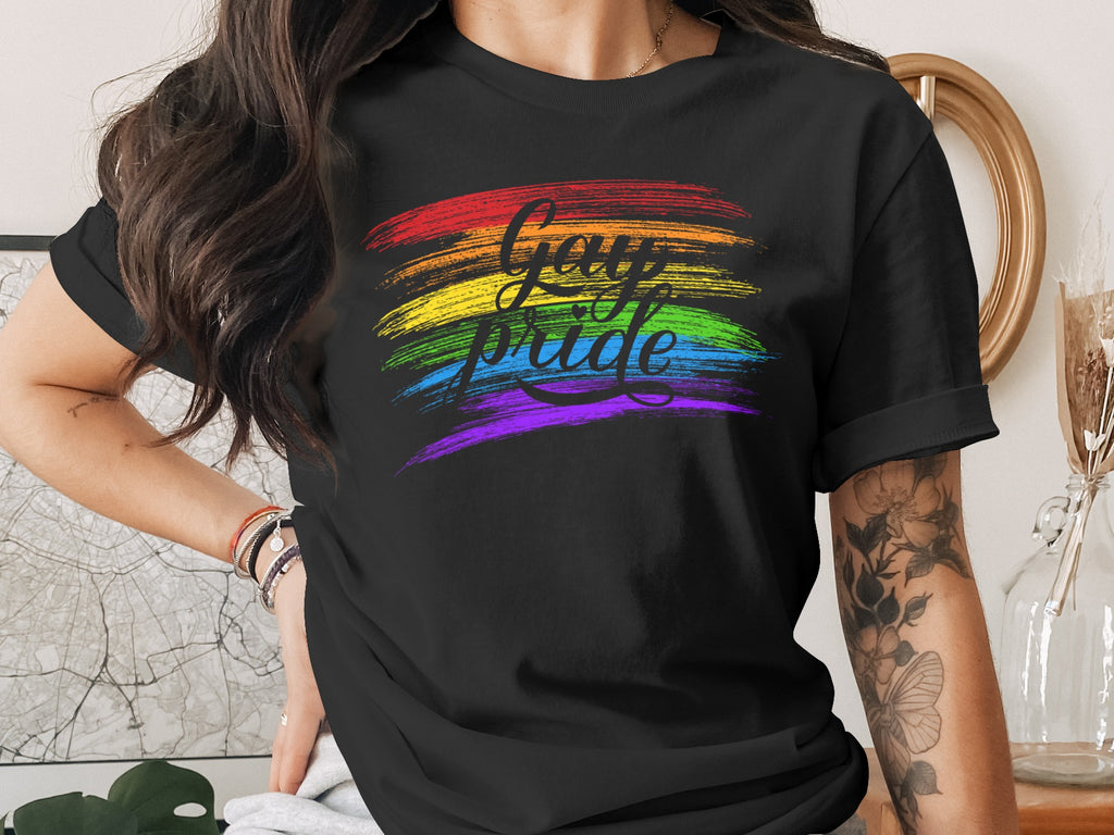 Black t-shirt with rainbow brushstrokes and "Gay pride" text.