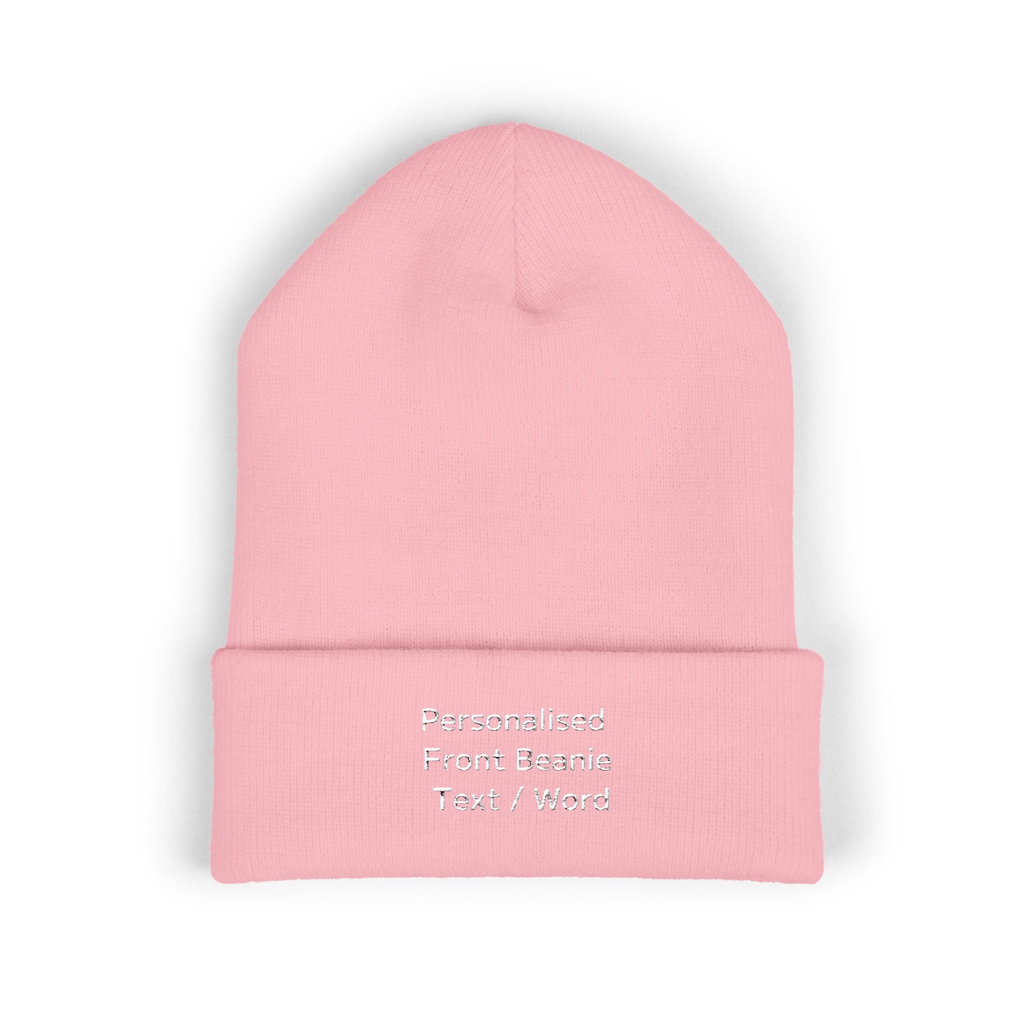 Pink knitted beanie with personalized front text.