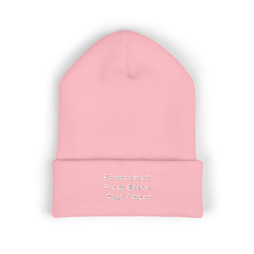 Pink knitted beanie with personalized front text.