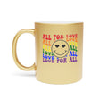 Gold mug with a smiley face and "All for Love" text in rainbow colors.