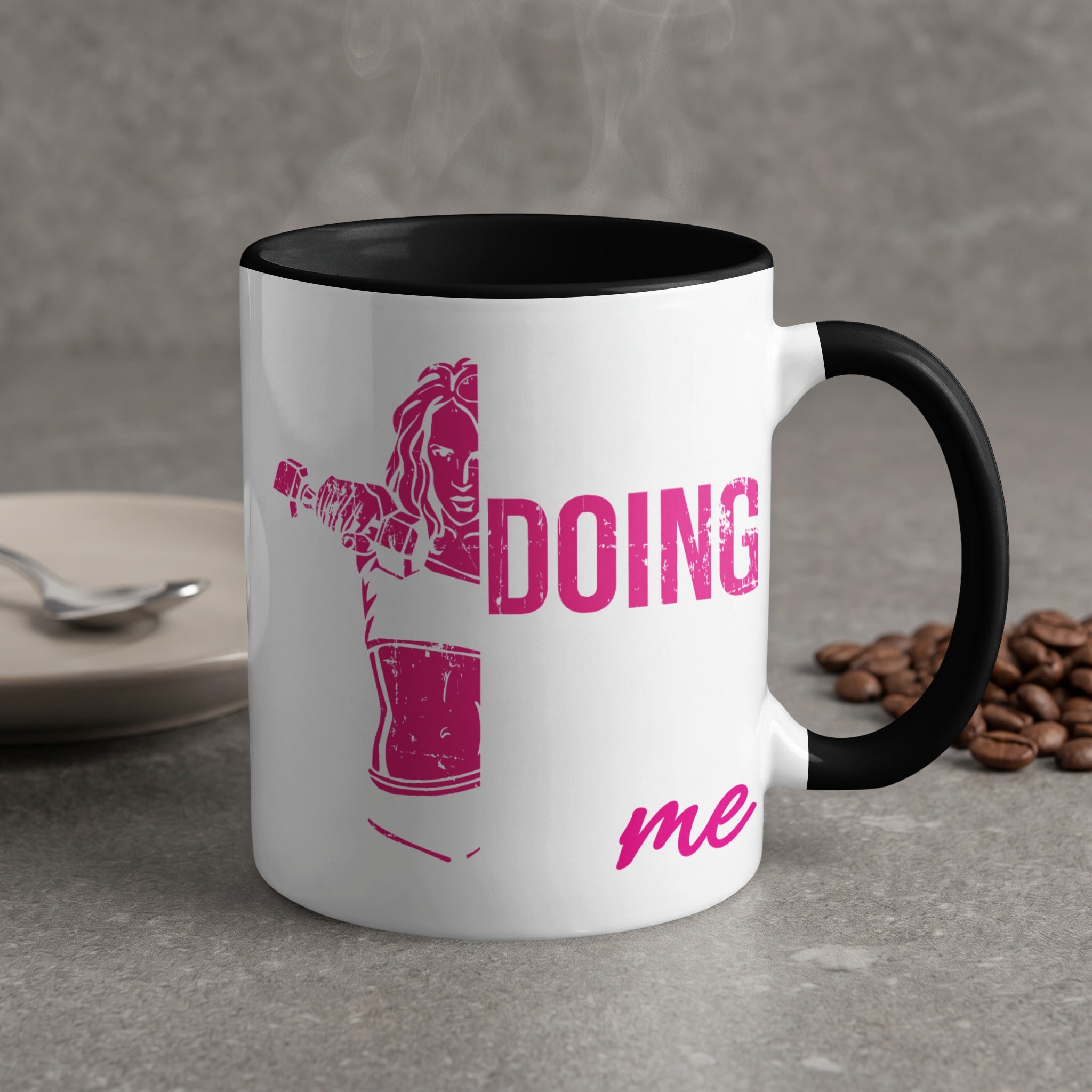 White mug with black rim, "DOING ME" in pink text and silhouette.