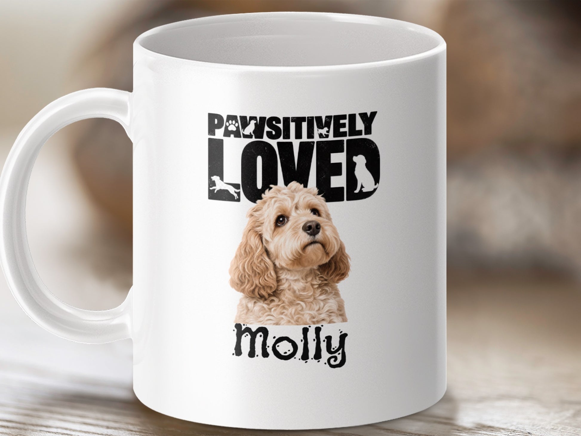 White mug with "PAWSITIVELY LOVED" text, a dog illustration, and "Molly".