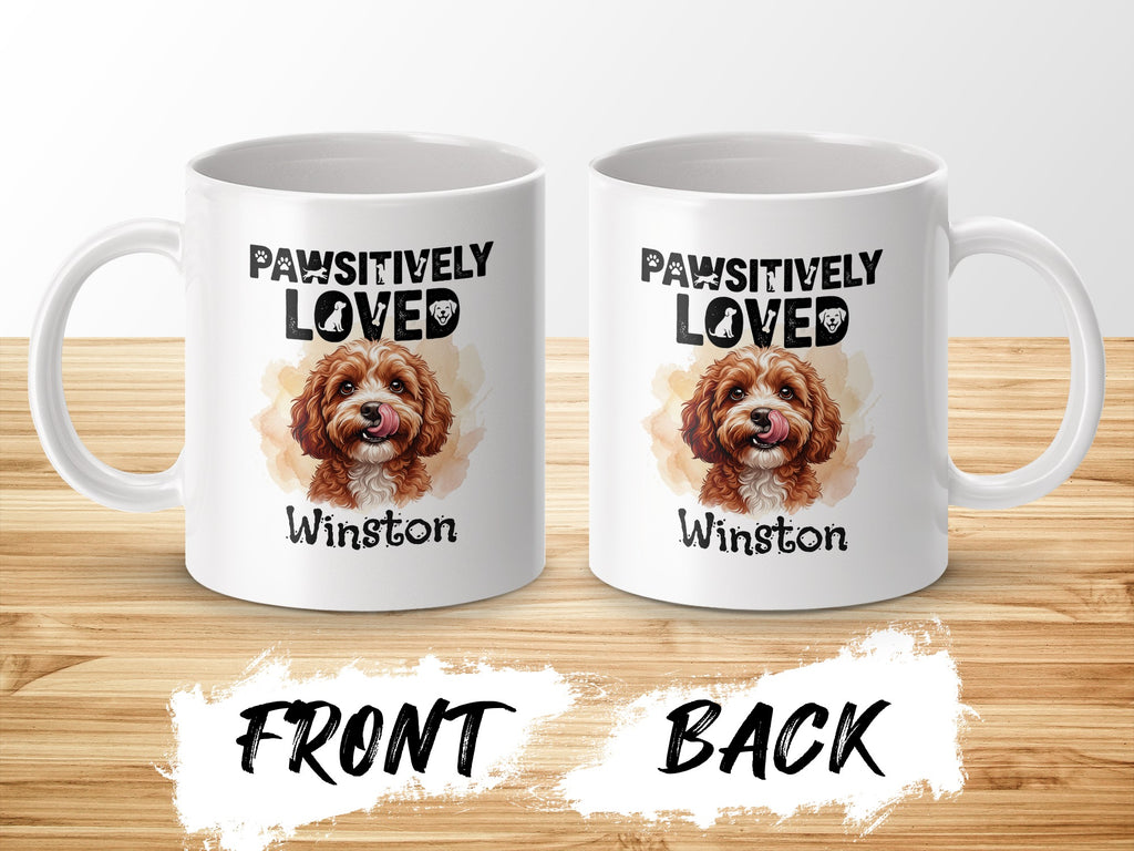Two white mugs with "Pawsitively Loved Winston" and a dog graphic.