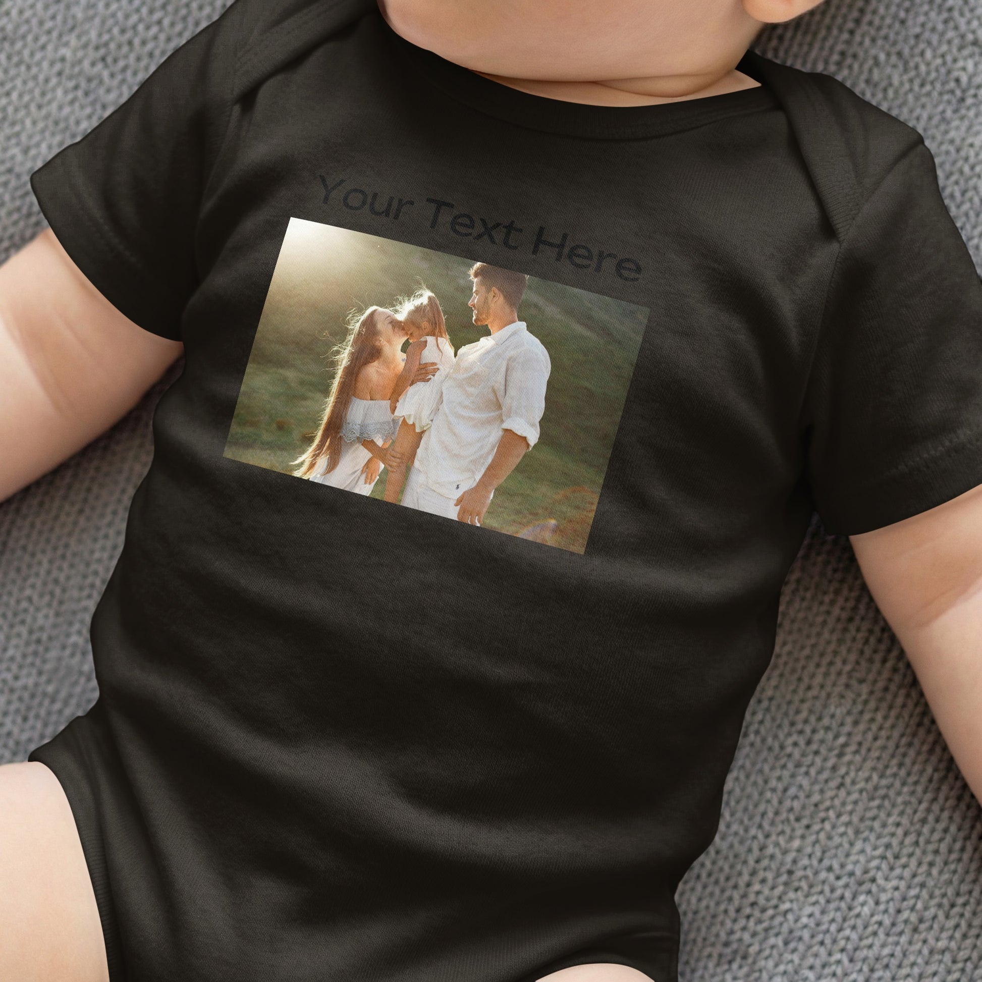 Black baby onesie with "Your Text Here" and a family photo on the chest.