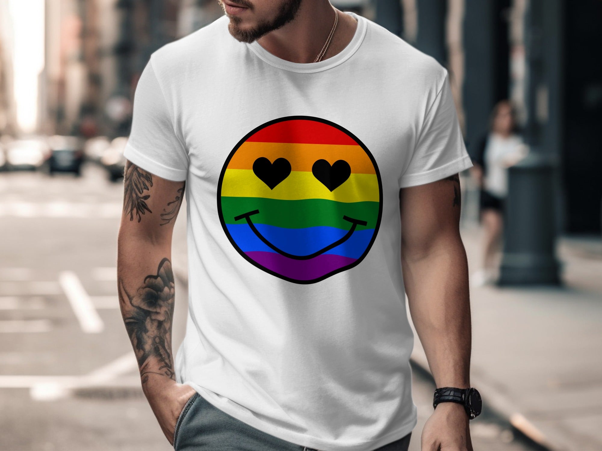 White t-shirt with a rainbow smiley face featuring black heart eyes.