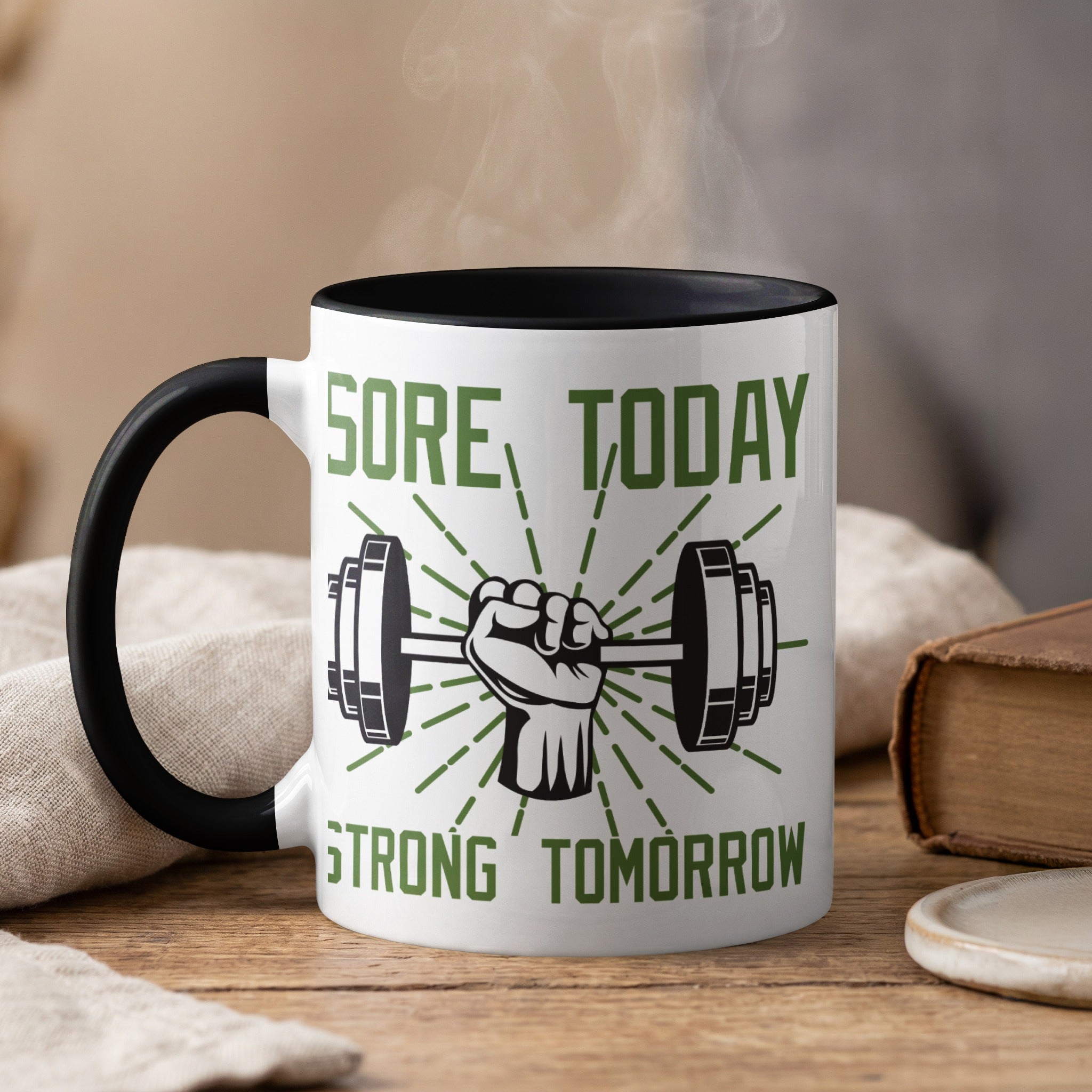 Mug with dumbbell, fist, and text "SORE TODAY STRONG TOMORROW."