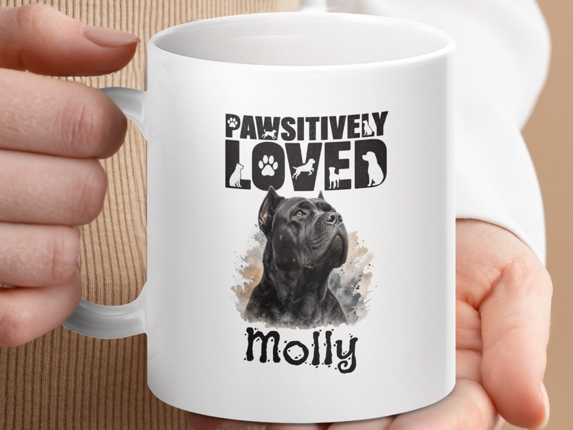 White mug featuring a black dog portrait, "PAWSITIVELY LOVED" text, and the name "Molly."