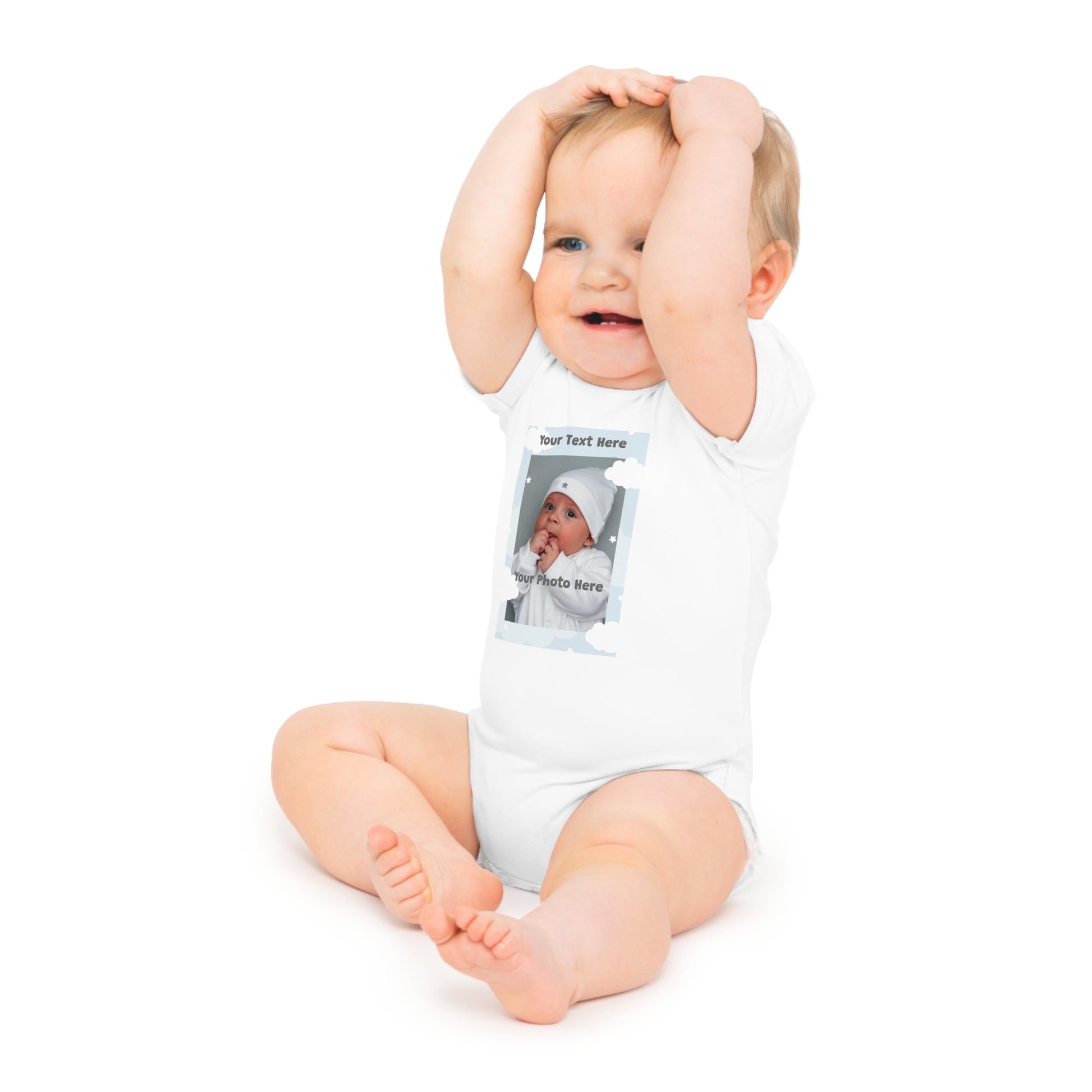 White baby onesie with a customizable picture frame and text area.