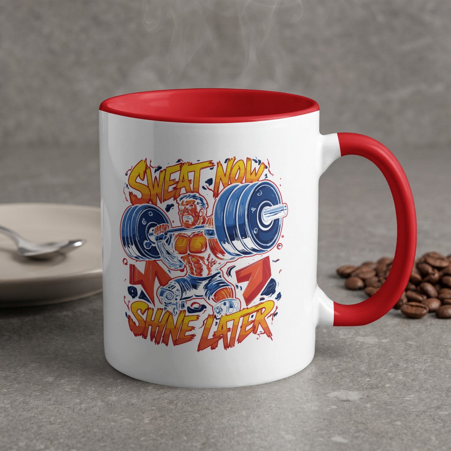 Red-handled mug with "Sweat Now Shine Later" text and muscular man lifting weights.
