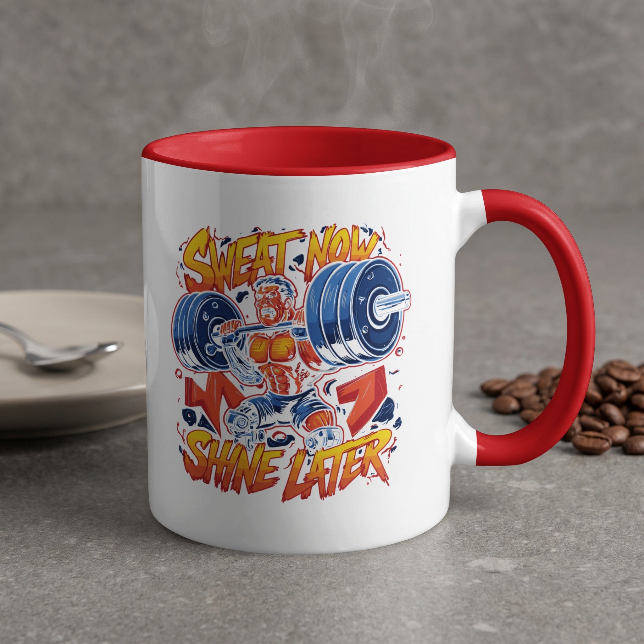 Red-handled mug with "Sweat Now Shine Later" text and muscular man lifting weights.