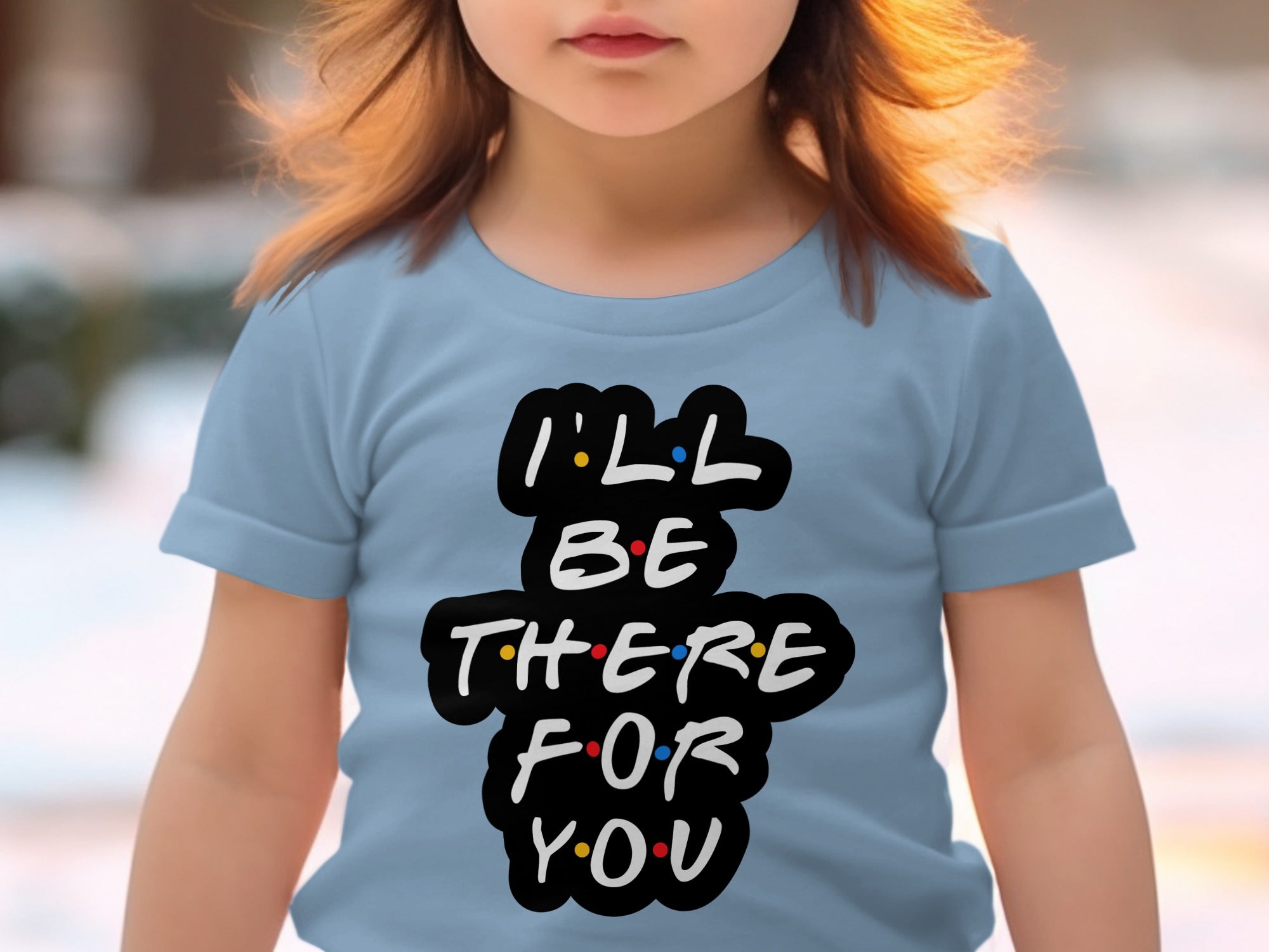 Light blue t-shirt with "I'll Be There For You" Friends-inspired text graphic.
