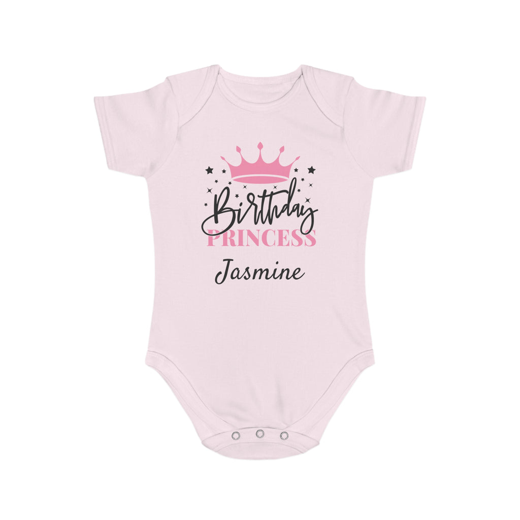 Pink baby onesie with "Birthday Princess Jasmine" and crown design.