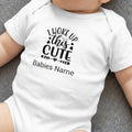 White baby onesie with "I Woke Up This Cute" text and baby's name.