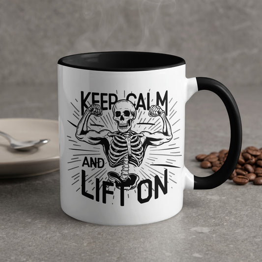 White mug with black rim featuring a skeleton flexing and text "Keep Calm and Lift On".