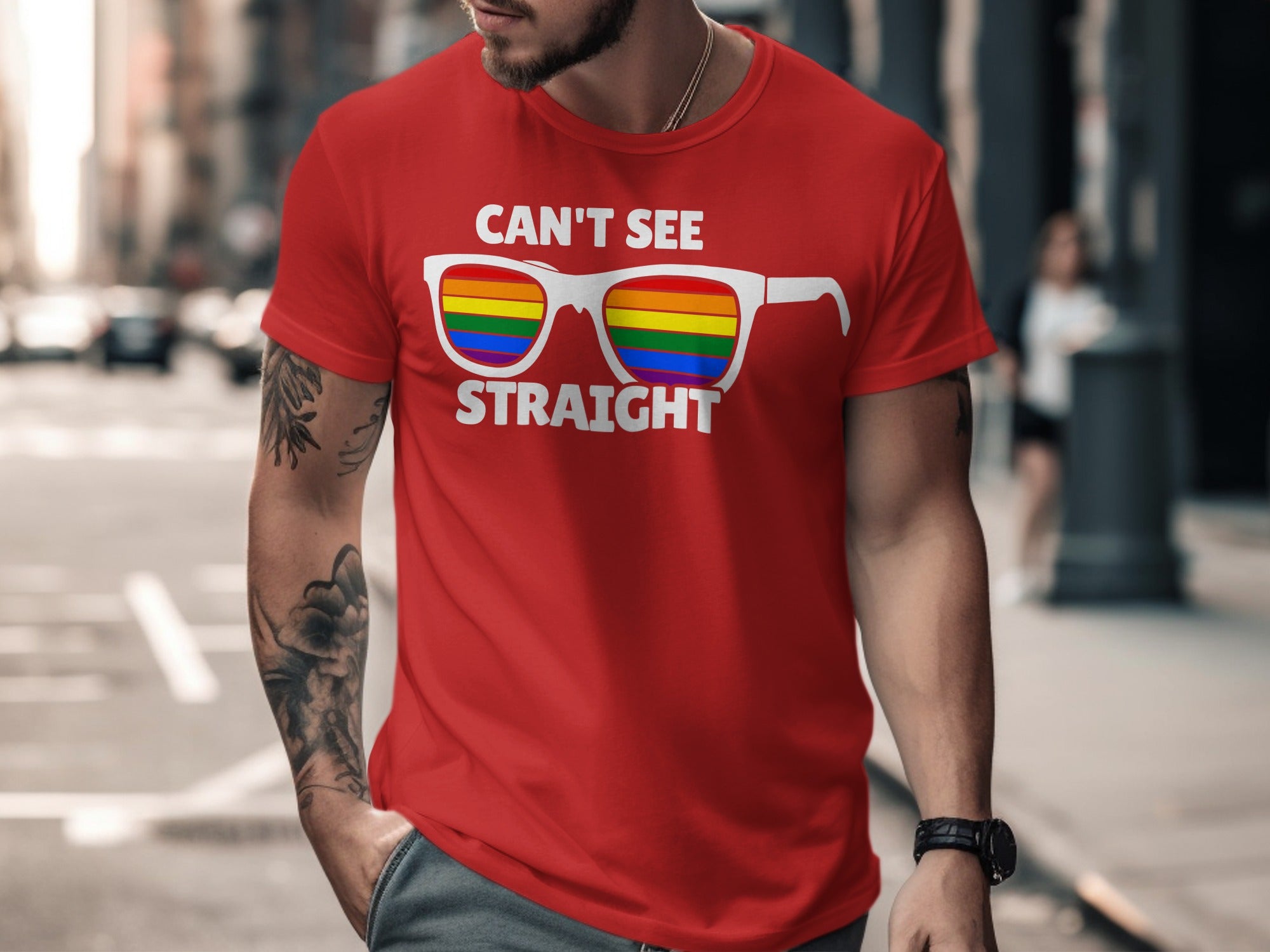Red t-shirt with white text and rainbow sunglasses graphic.