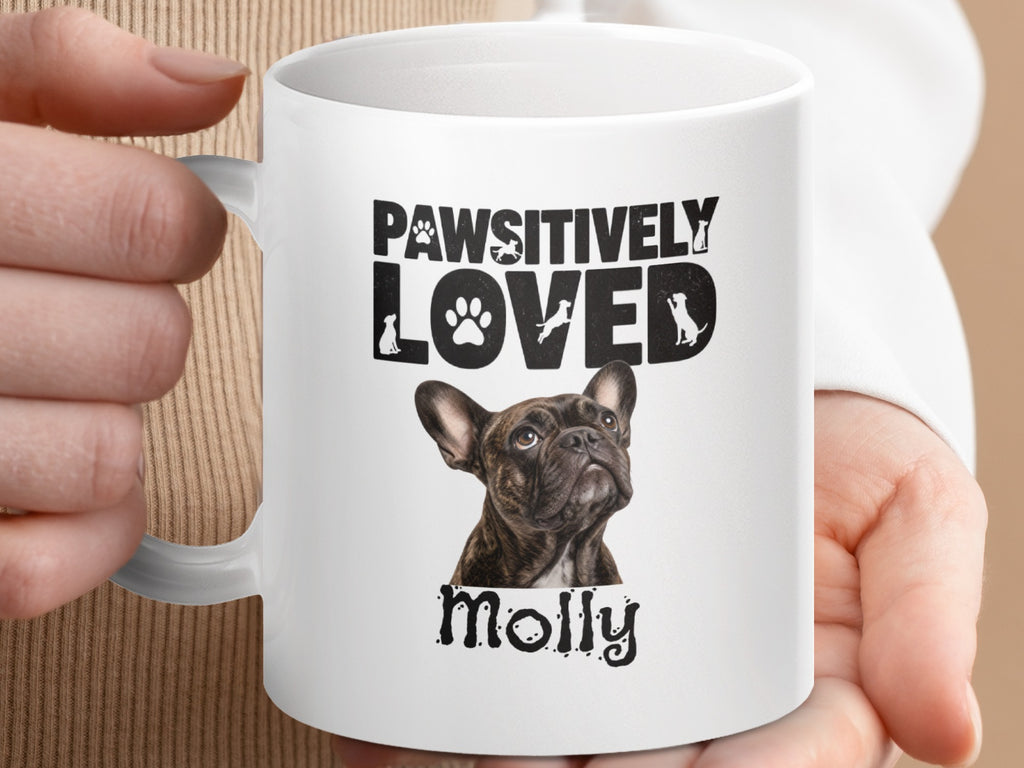 Mug with "PAWSITIVELY LOVED Molly" text and French Bulldog image.