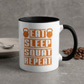 White mug with black rim and handle, "Eat Sleep Squat Repeat" text.
