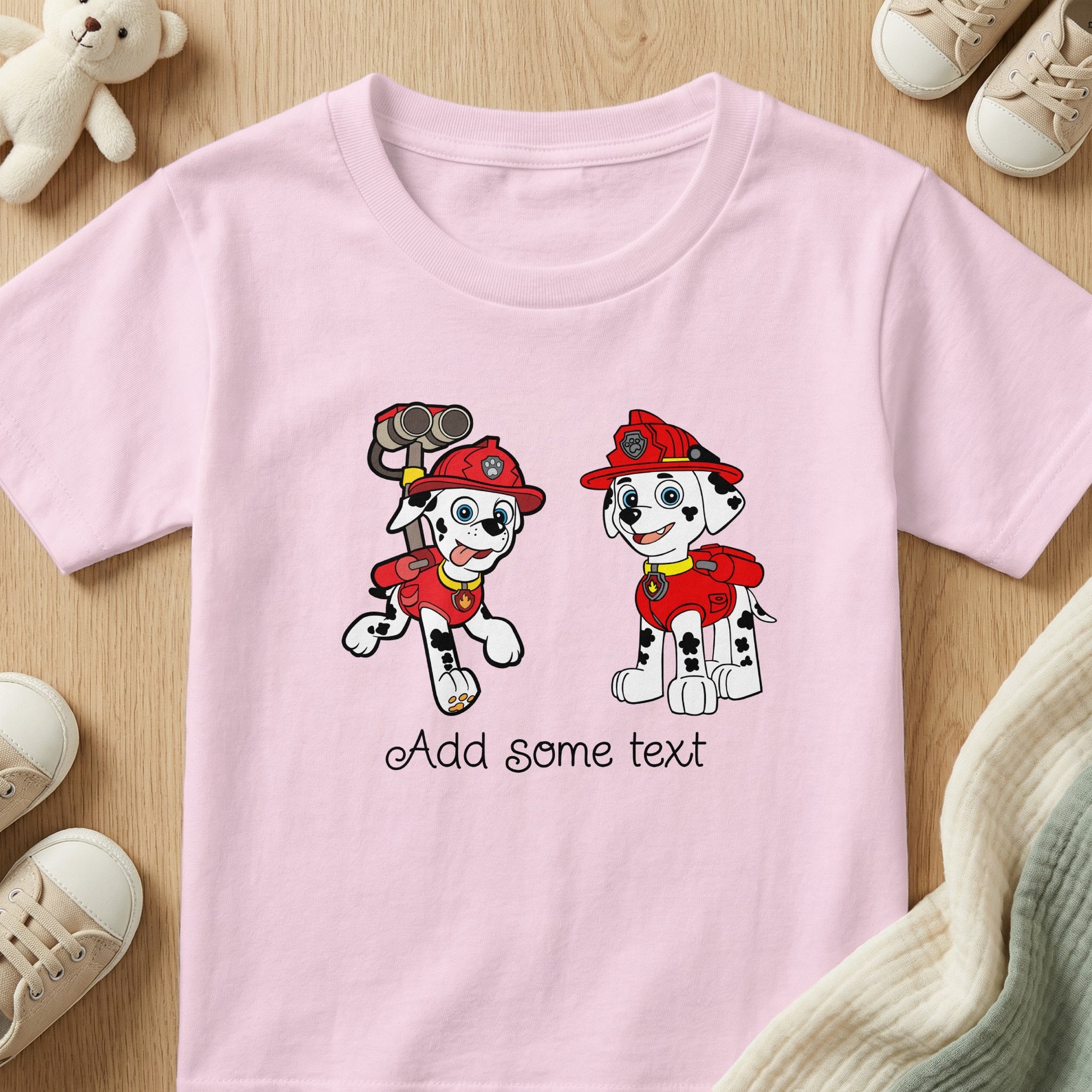Paw Patrol characters Marshall and Chase on a pink t-shirt with text "Add some text".