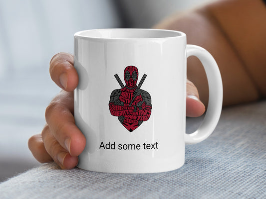 White mug with Deadpool silhouette made of text, "Add some text" graphic.