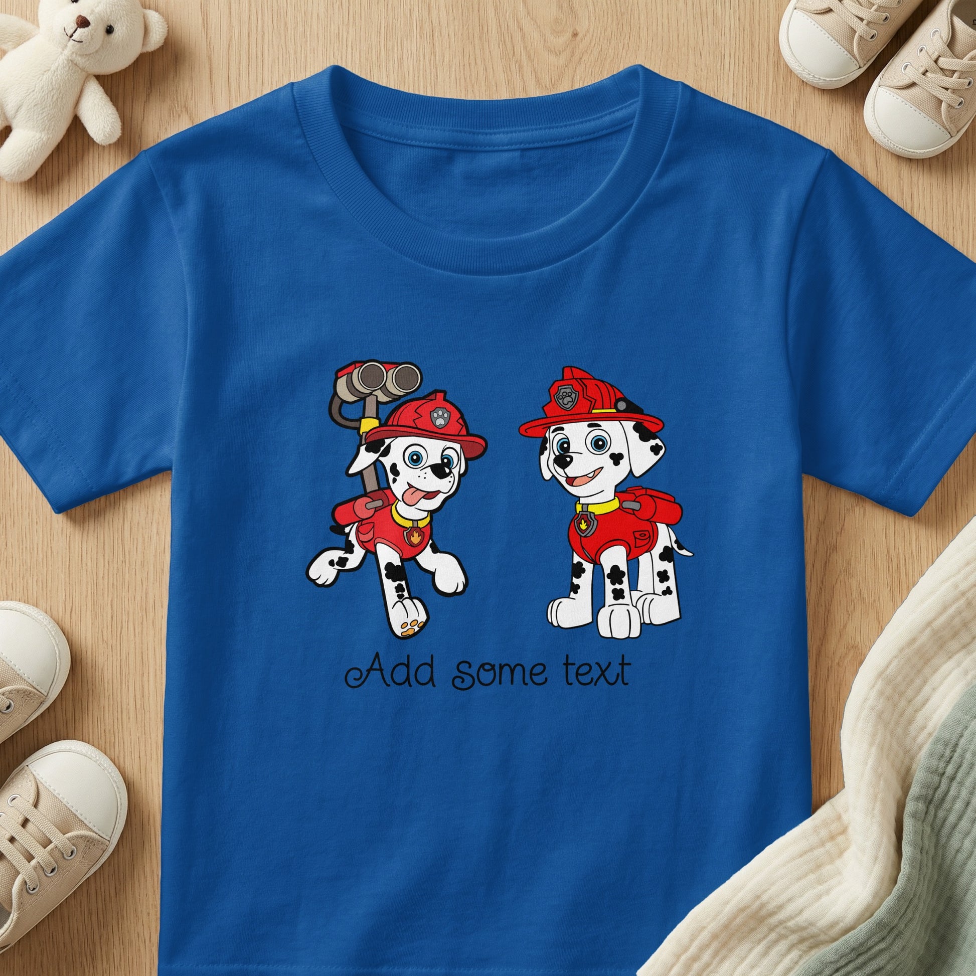 Blue t-shirt with two dalmatians in firefighter gear, saying "Add some text".