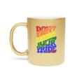 Gold mug with rainbow text reading "Don't hide Your Pride".