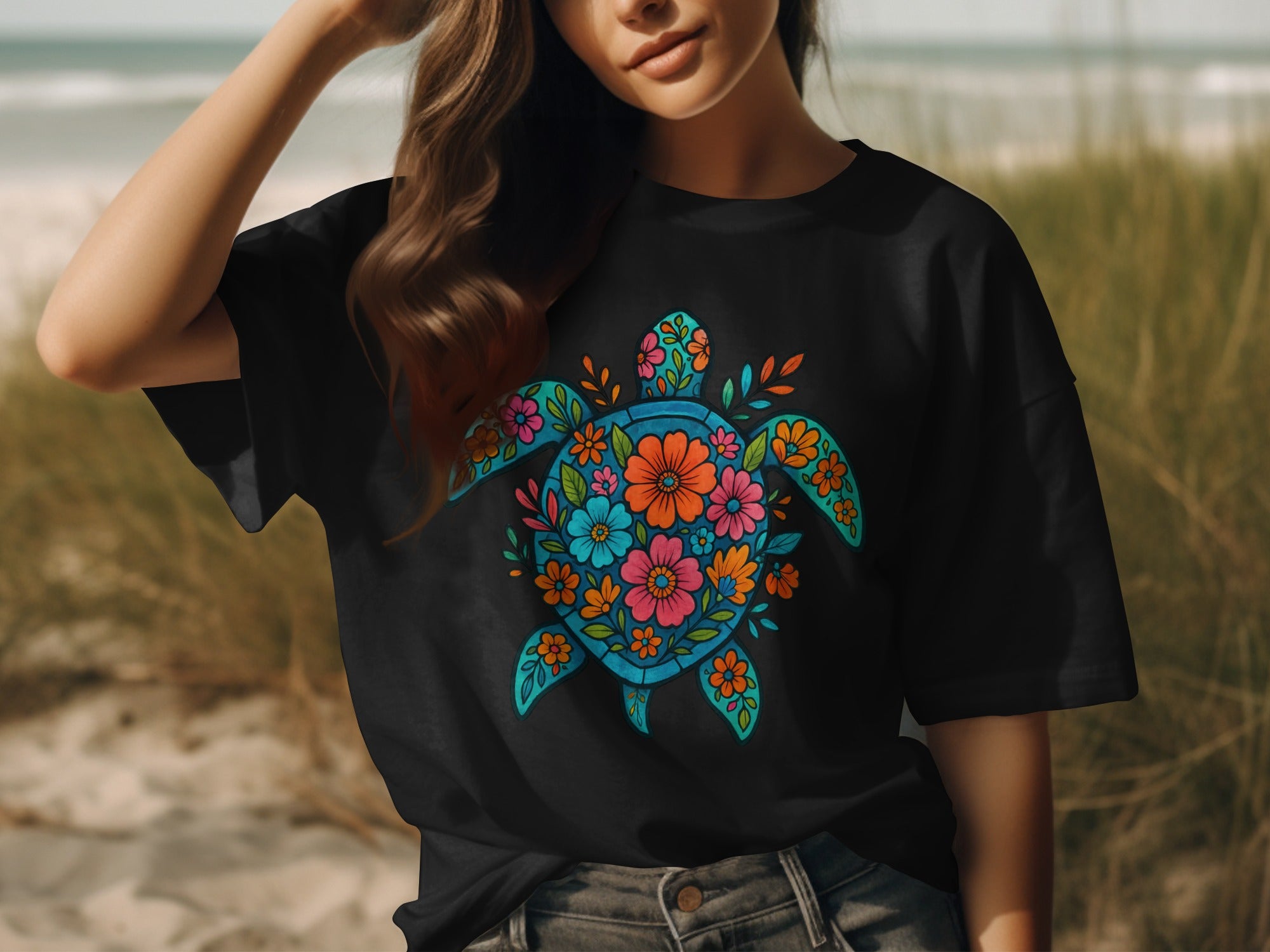 Black t-shirt with a colorful floral sea turtle graphic on the front.