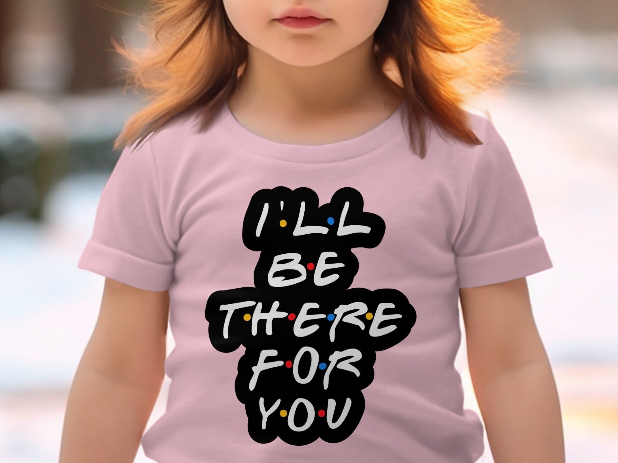 Toddler wearing pink t-shirt with "I'LL BE THERE FOR YOU" Friends-style text.