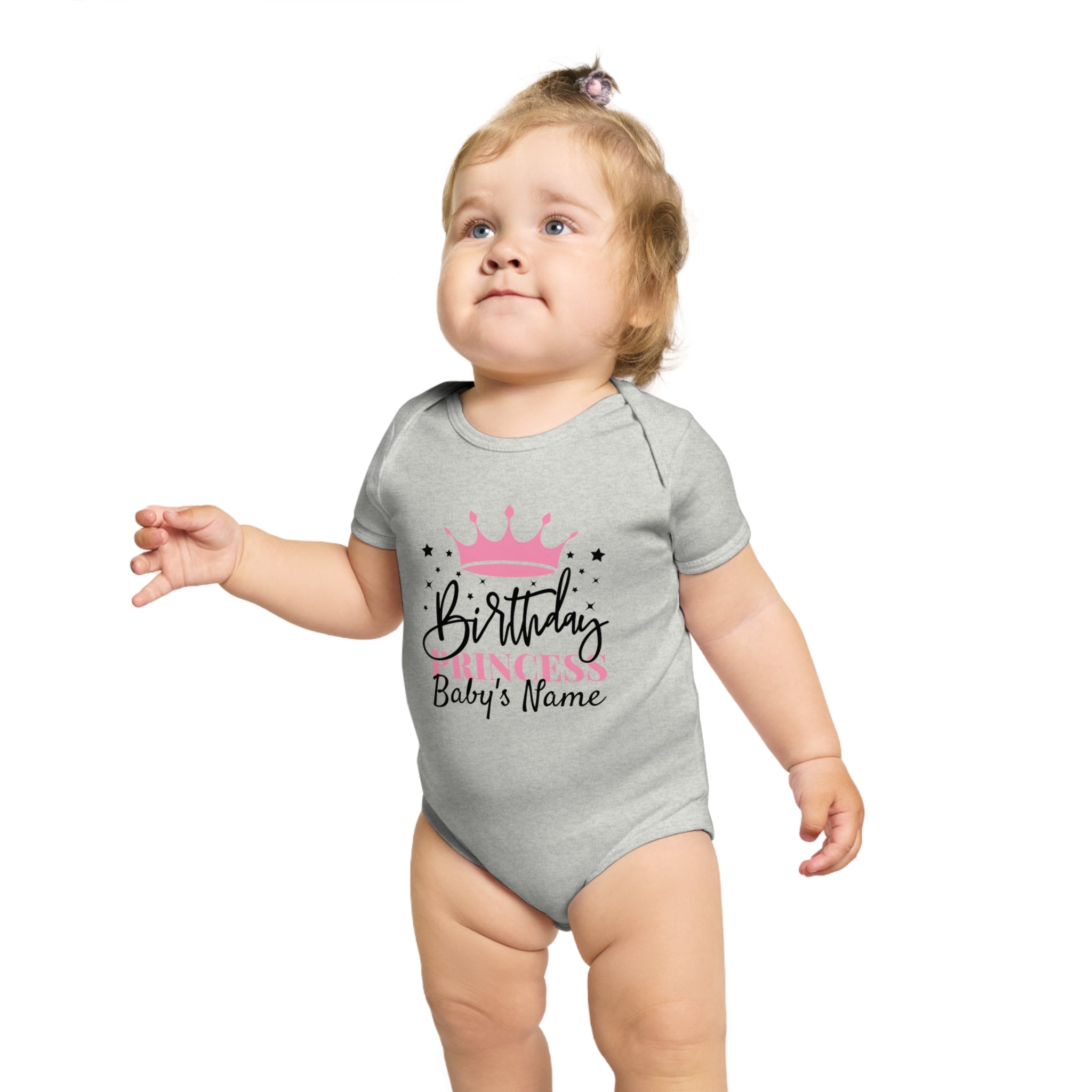 Baby in gray bodysuit with "Birthday Princess" text and crown graphic.
