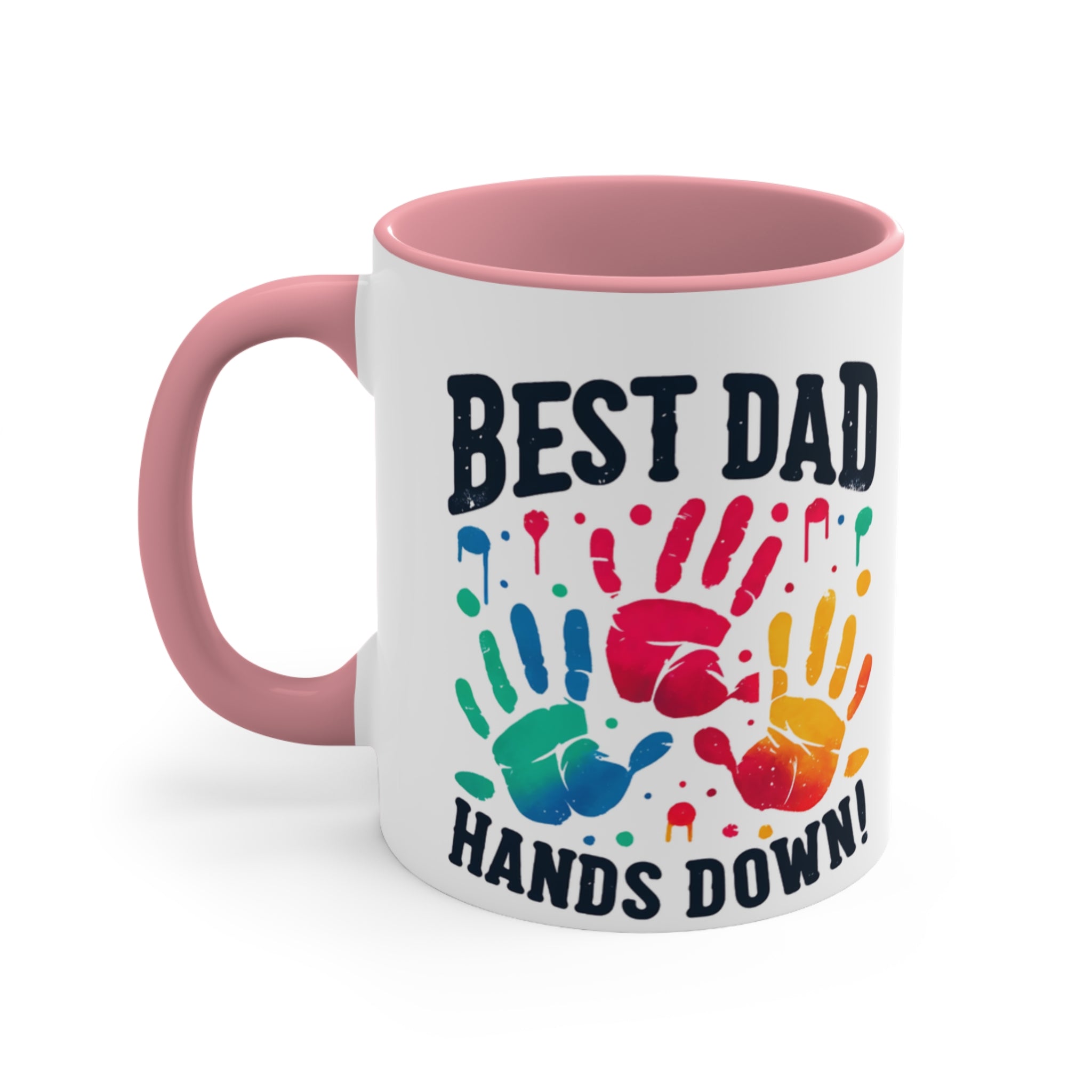 White mug with pink handle, colorful handprints and text "BEST DAD HANDS DOWN!".