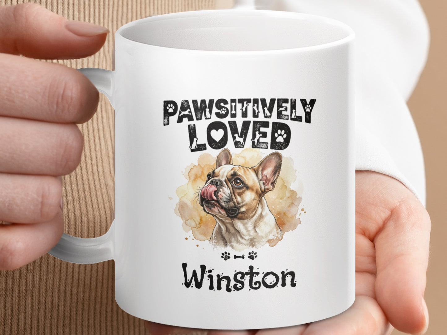 White mug with "PAWSITIVELY LOVED Winston" and French Bulldog illustration.